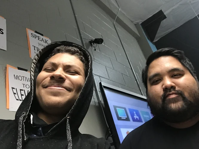 Photo of Daniel Avery, math teacher at IVA High in Long Beach with a student.