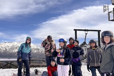 IVA High counselor Makenna Briceno snowboarding with students in Big Bear as part of the Outdoor Adventure Club.
