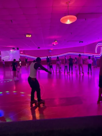 IVA High school students roller skate in an indoor rink during an event organized by the Different Shades of Brown club.