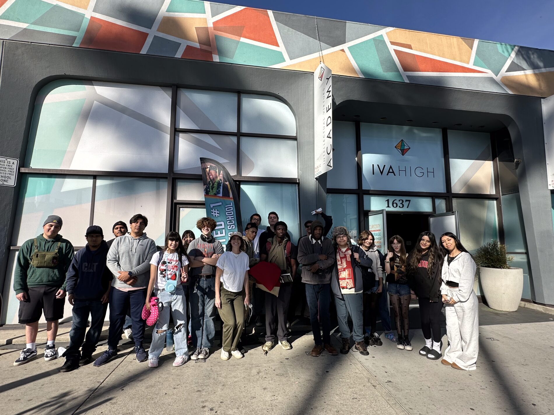 Students stand together for a photo outside IVA High.