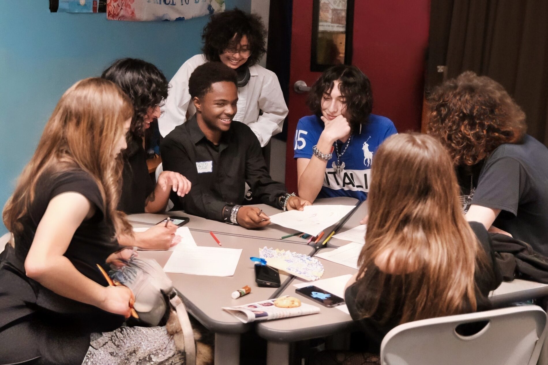 students at IVA High work together at a table
